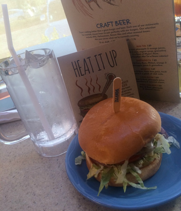 Don't let the glass of water fool you! The Heat Wave burger definitely earns its name! 