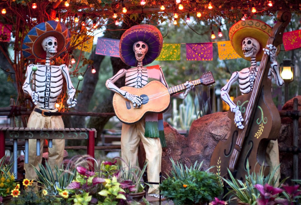 DIA DE LOS MUERTOS (ANAHEIM, Calif.)  A colorful display at Disneyland park honors Dia de los Muertos with cheerful skeletons, sugar skulls and marigolds during Halloween Time at the Disneyland Resort, from Sept. 9 through Oct. 31 2016. The Halloween season features seasonal entertainment and décor, in addition to the return of Haunted Mansion Holiday and Space Mountain Ghost Galaxy. This year, the family-friendly Mickeys Halloween Party will be held on 17 nights at Disneyland Park, where guests are invited to trick-or-treat in costume, celebrate with favorite Disney characters and enjoy the Halloween Screams fireworks spectacular. (Paul Hiffmeyer/Disneyland Resort)