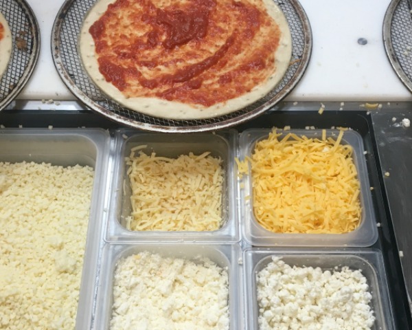 pizza-press-sauce-and-cheese