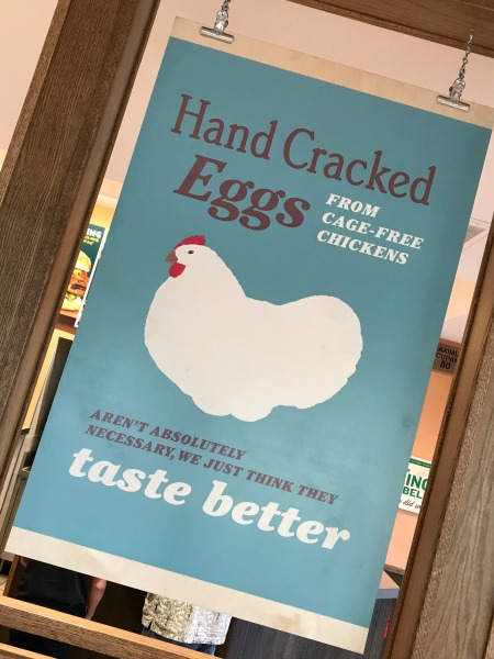farmer-boys-hand-cracked-eggs